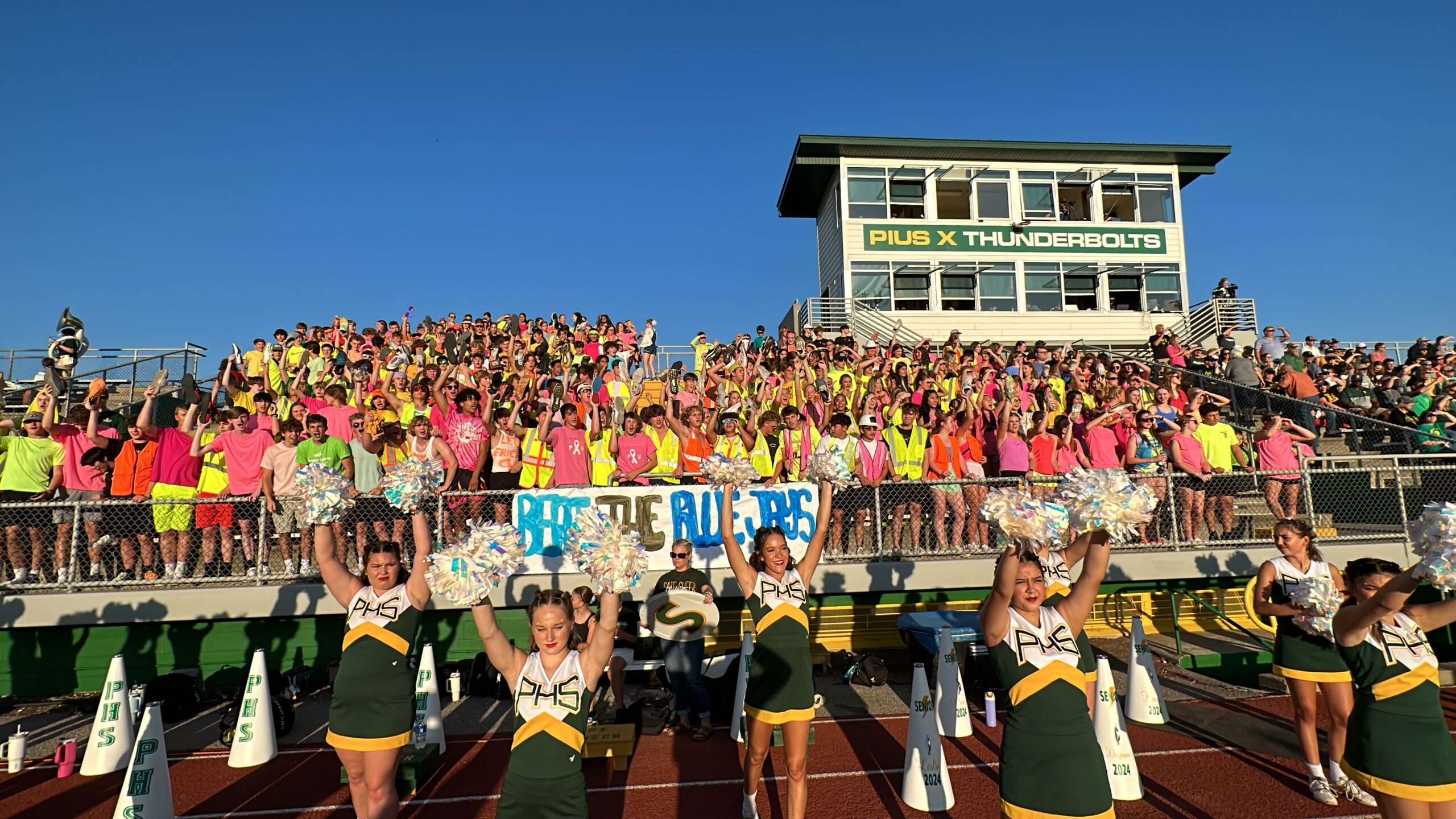 cheer and student section at football game scaled