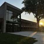 school front entrance in sunset
